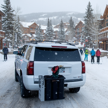 Load image into Gallery viewer, GR-6 Ski Hitch Rack mounted on white SUV, demonstrating ski transport capability for winter sports using 2" hitch receiver.